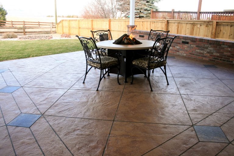 Back patio with Bomanite imprinted concrete and colored diamond sections