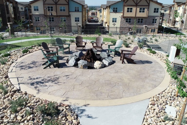Bomanite imprinted flatwork around fire pit at Vantage Point Apartments.