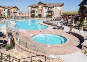 Distant perspective of Bomanite imprinted pool deck at Vantage Point Apartments.