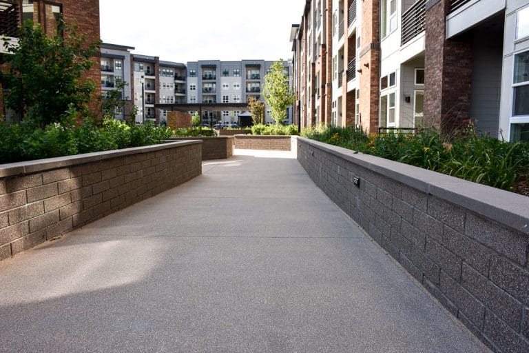 A Sandscape walkway leading down to courtyard