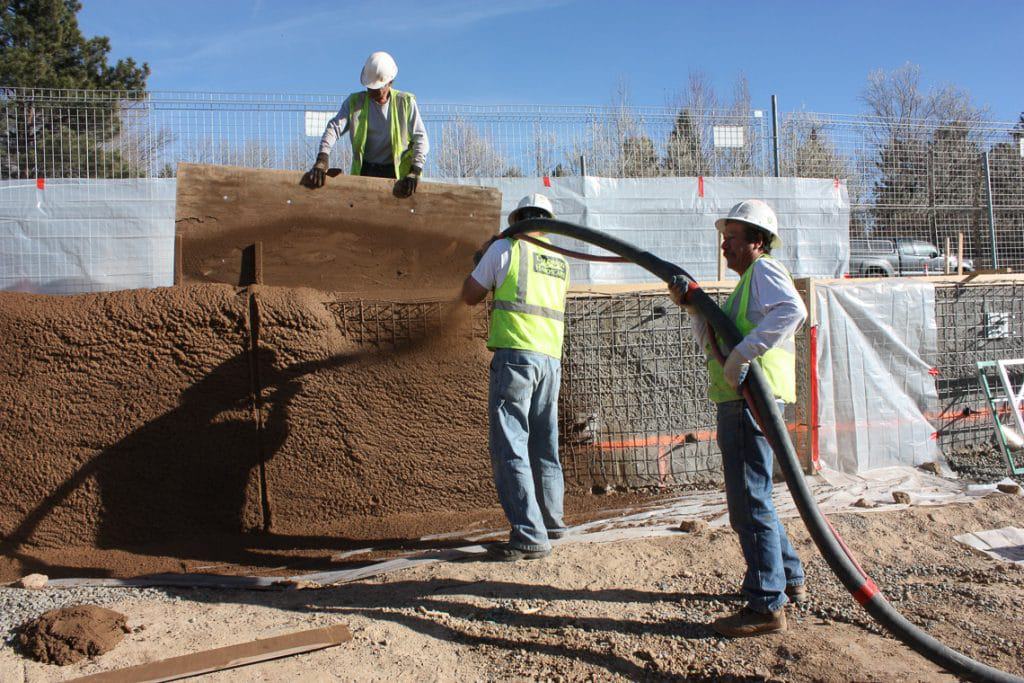 Shotcrete installing the concrete wall