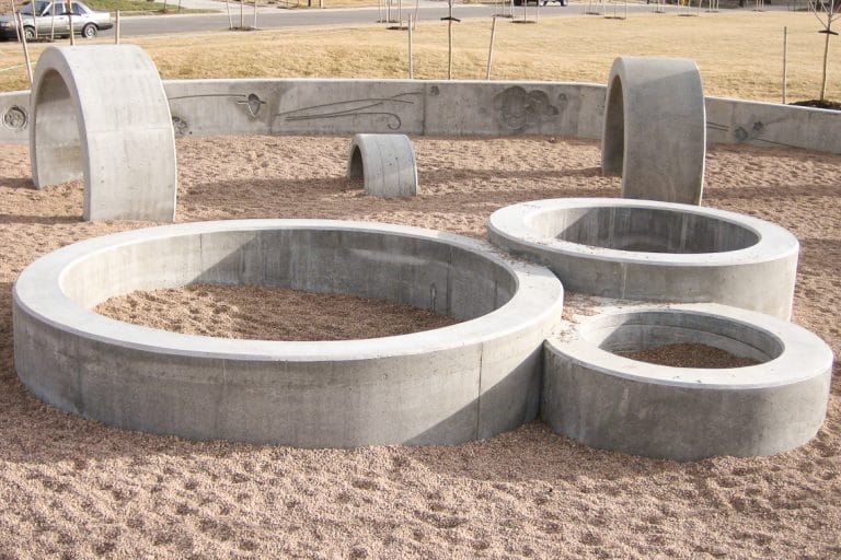 Concrete rings in playground finished with form finish method