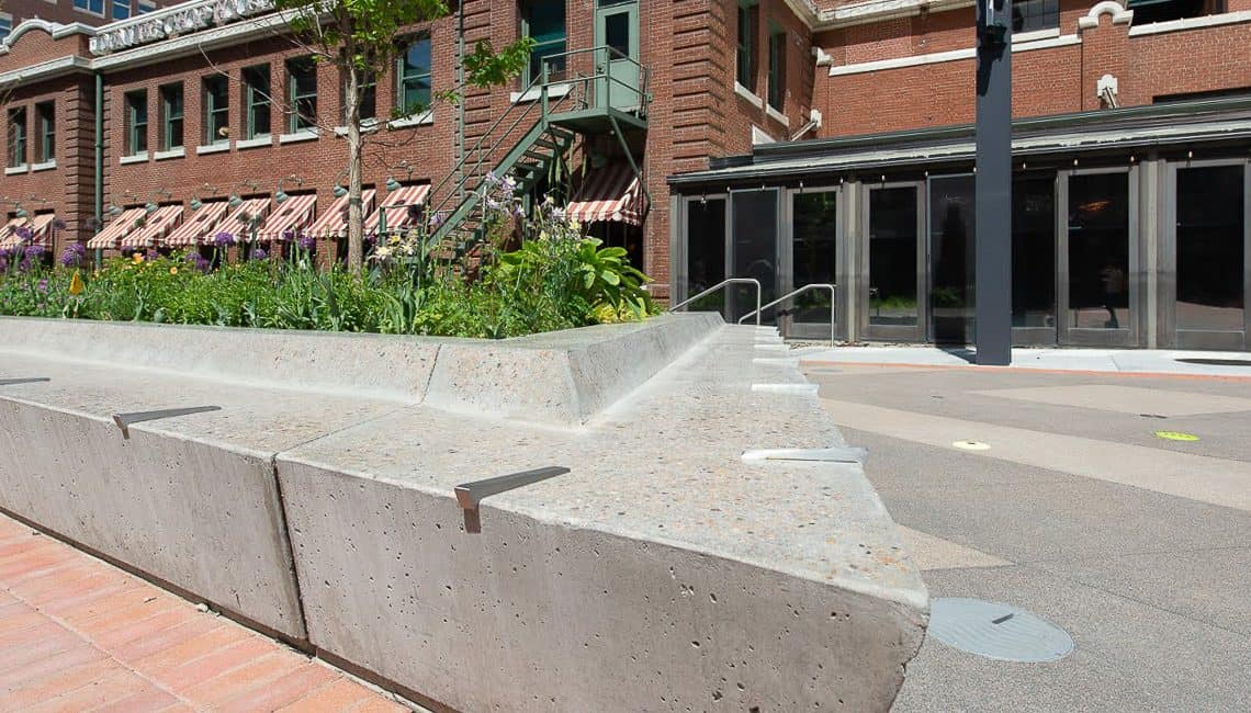 McGregor Square polished concrete benches in plaza at Downtown Denver.